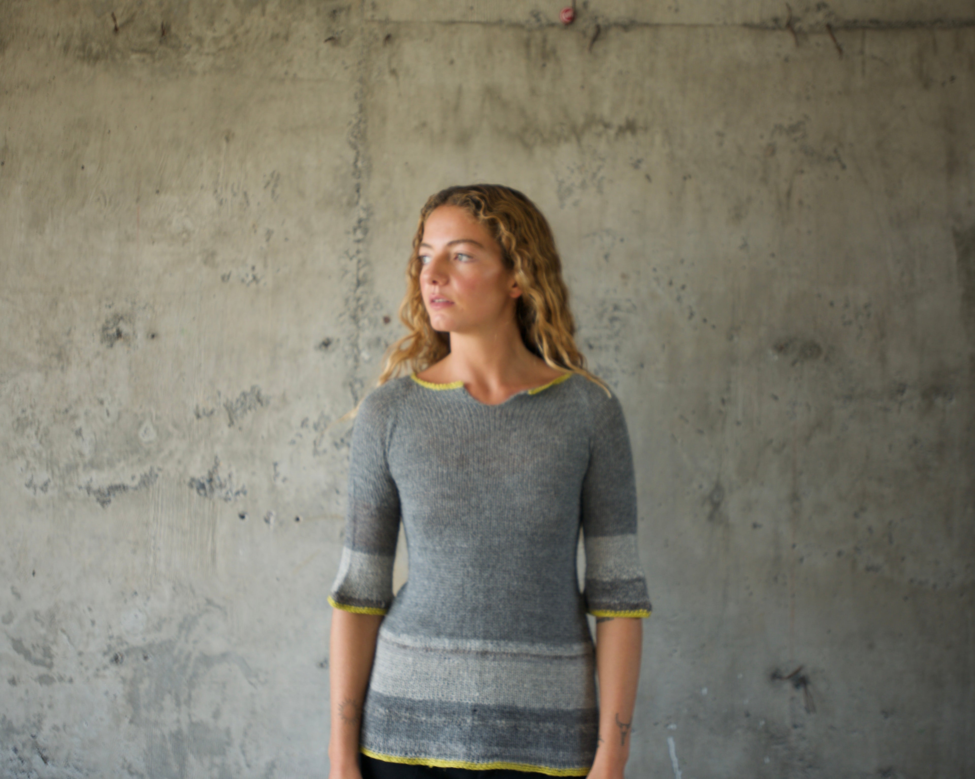 Sweater alpaca grises orilla