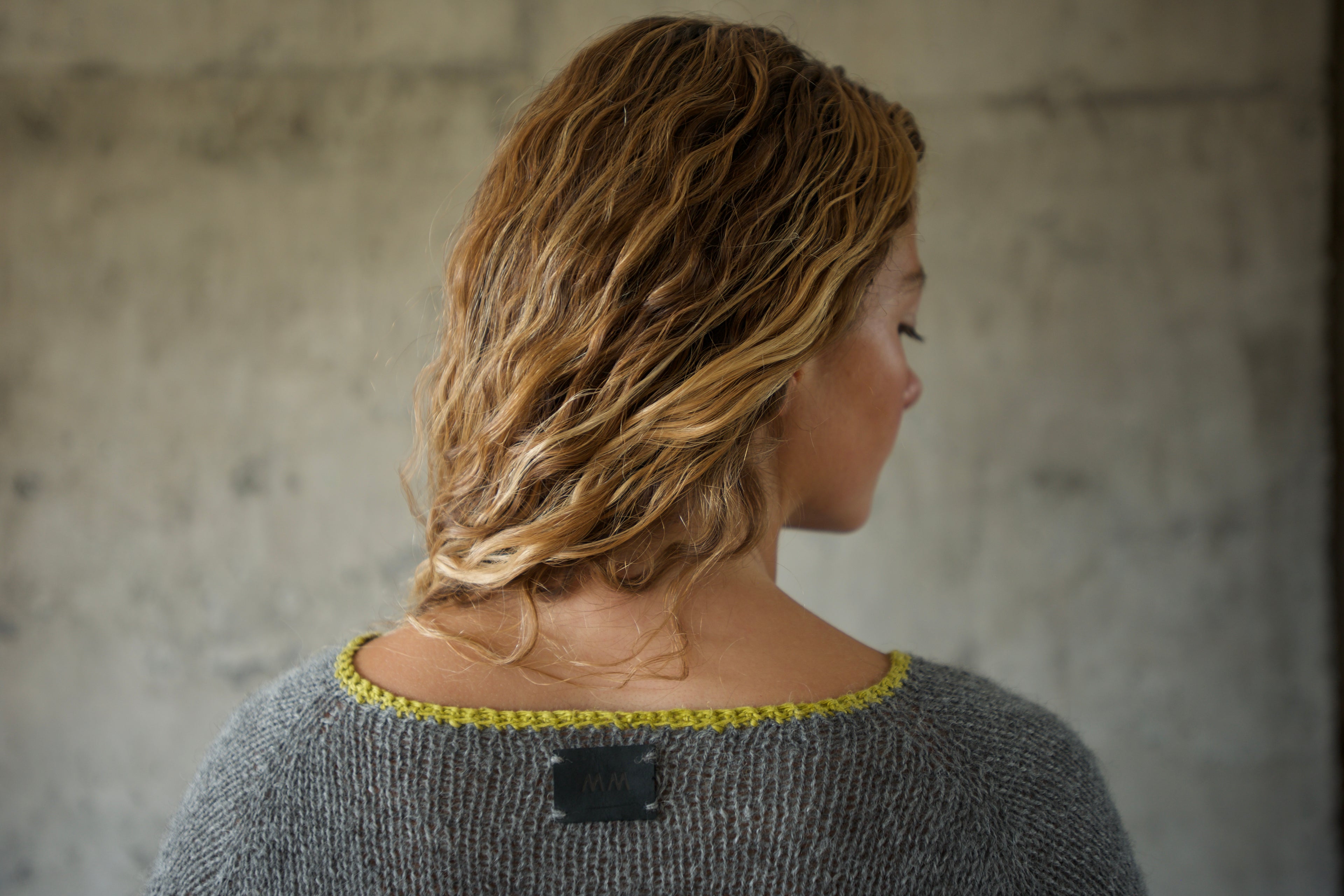Sweater alpaca grises orilla