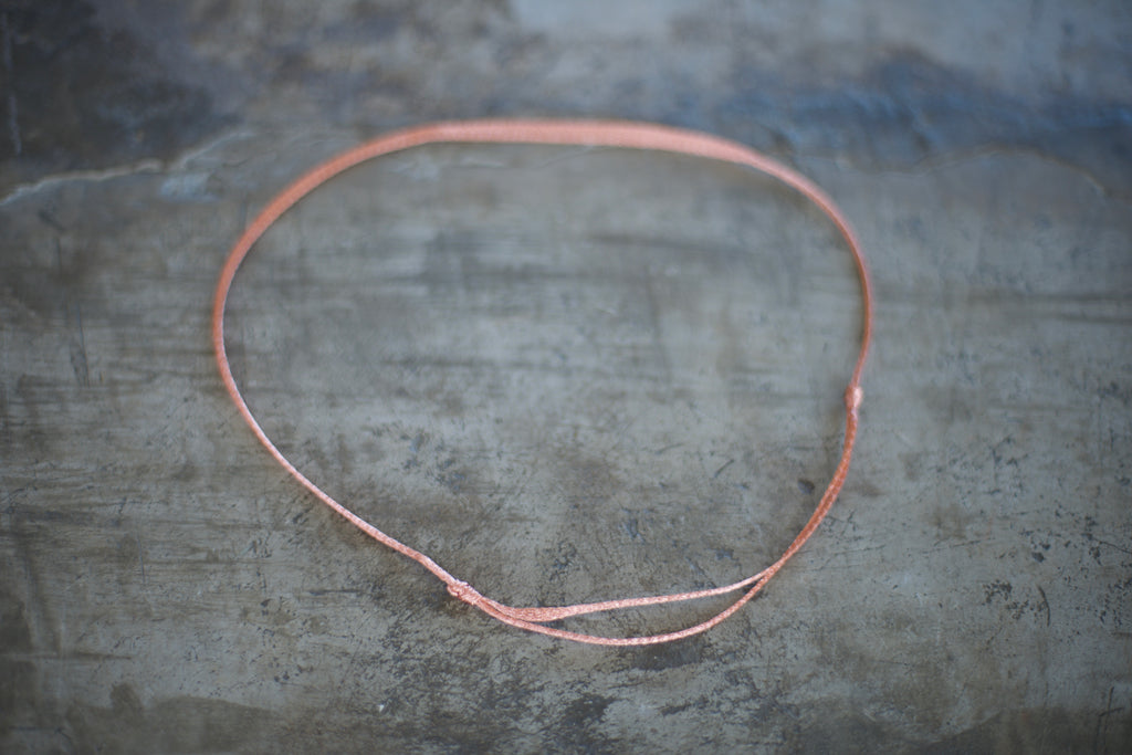 Collar nudo corredizo